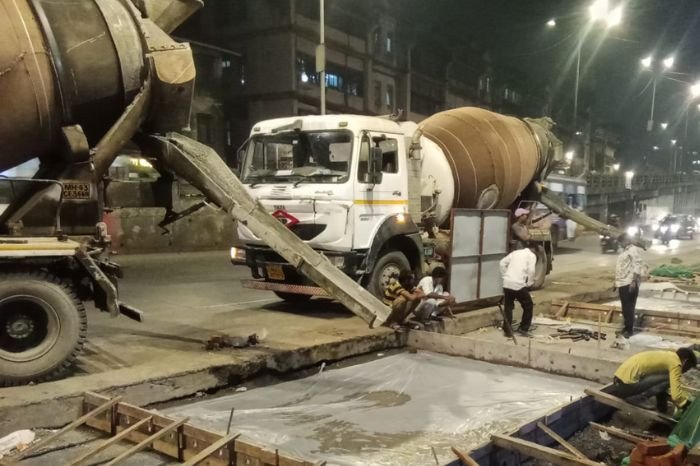 RCC concrete slab casting in progress with reinforcement steel mesh